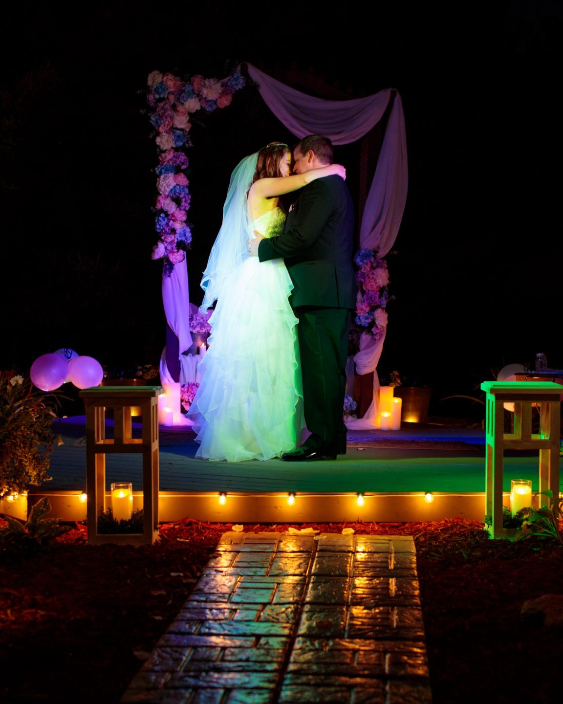 A wedding couple's first dance.  An excellent example where wedding photography equipment matters. Photographed with the Canon 50mm f/1.2 L lens.