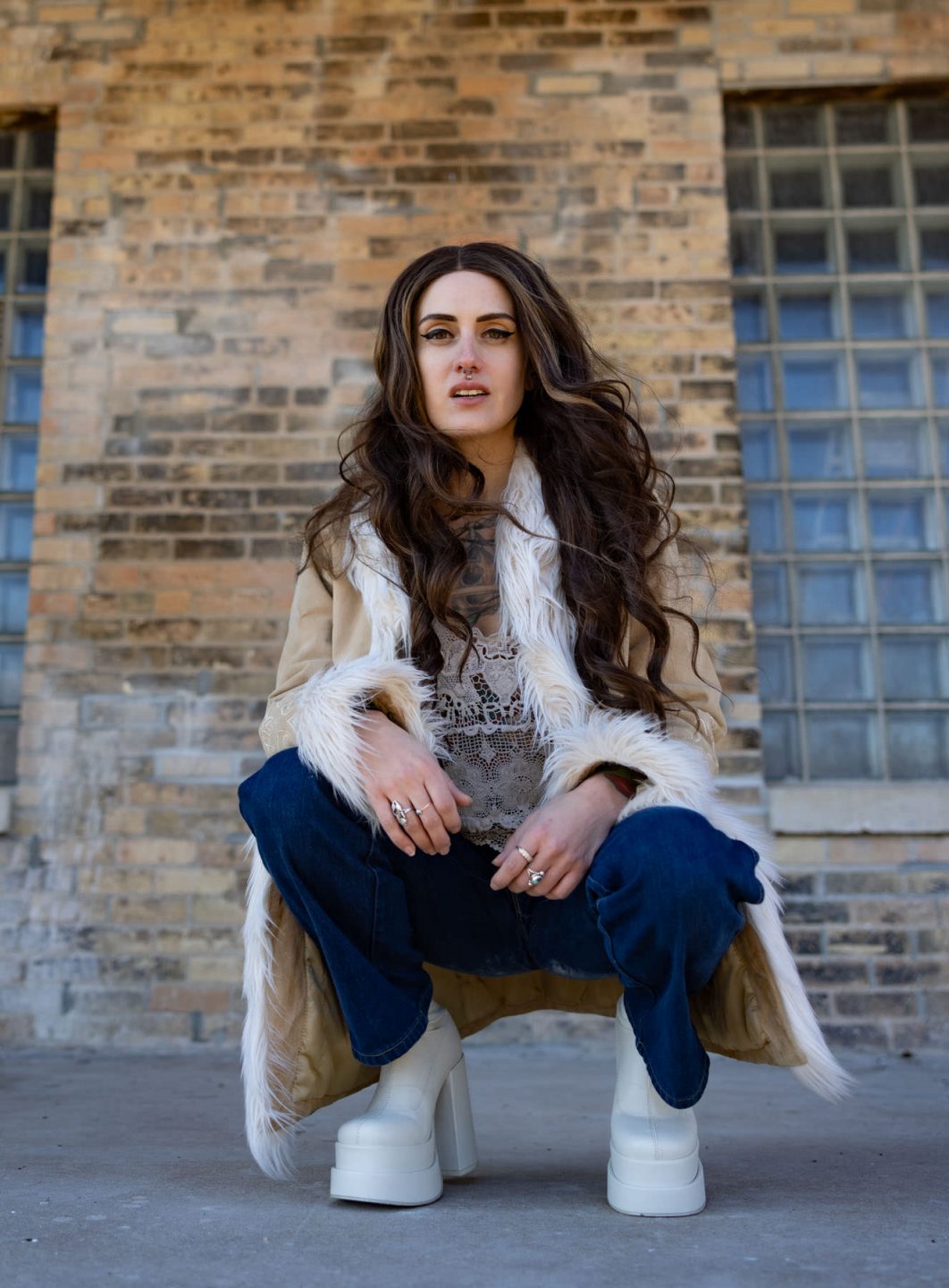 female model posing in a winter jacket