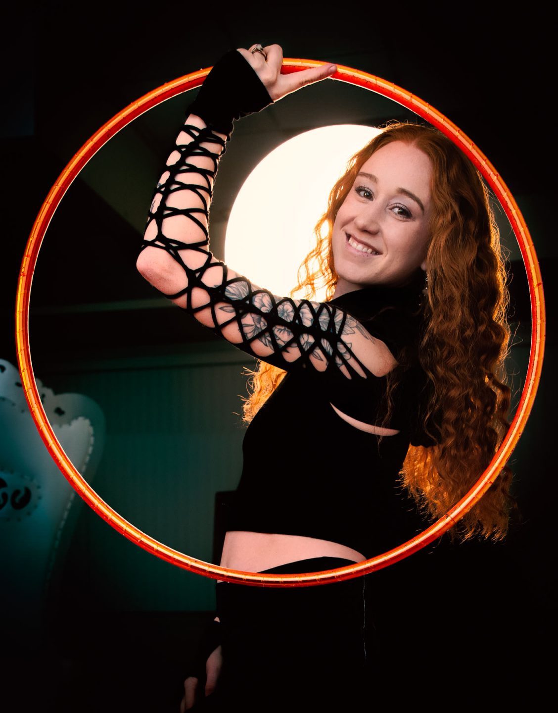 hoop performer - backlit